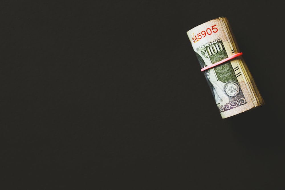 Calculator and financial documents showing hidden costs of remote hiring